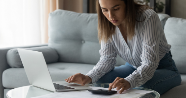 image of a woman typing on a computer
